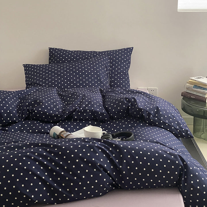 Cotton percale bedding set with minimalist polka dot pattern and hotel closure