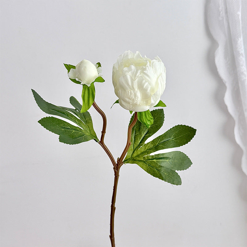 Artificial peony bouquet with delicate flowers and leaves