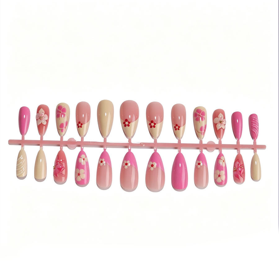 Artificial nail set with floral accents and glitter elements Kalsten