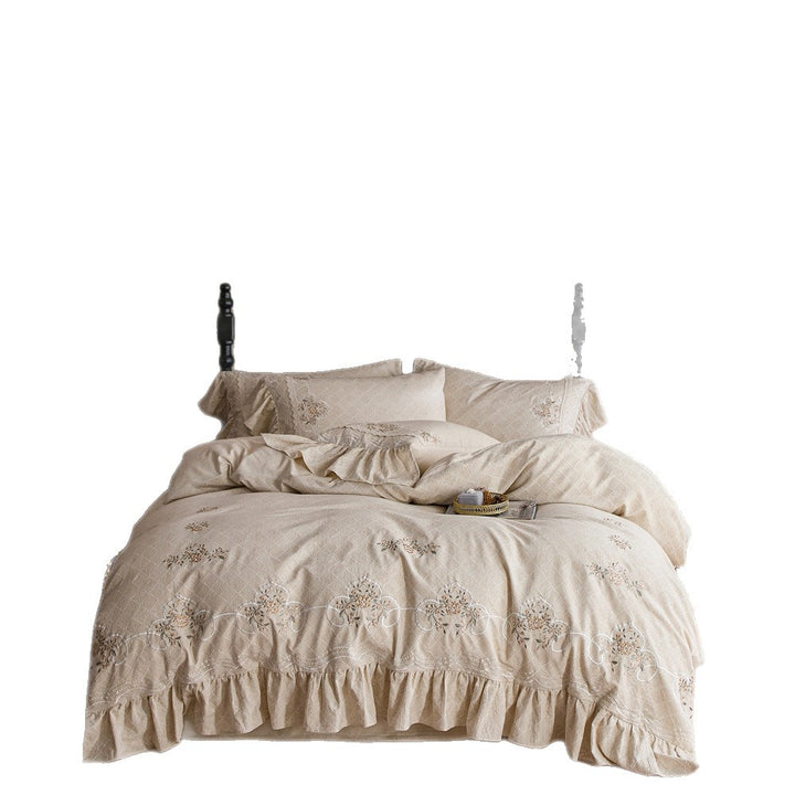 Romantic cotton bedding set with diamond jacquard, embroidered border, and gathered ruffle