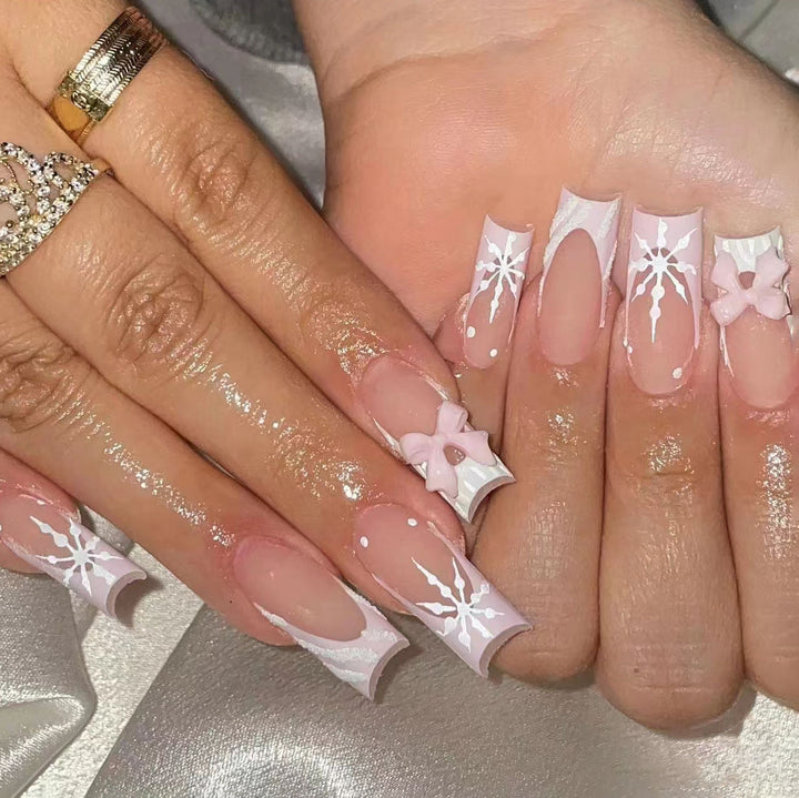 Artistic Press-On Nail Set with Floral and Snowflake Designs