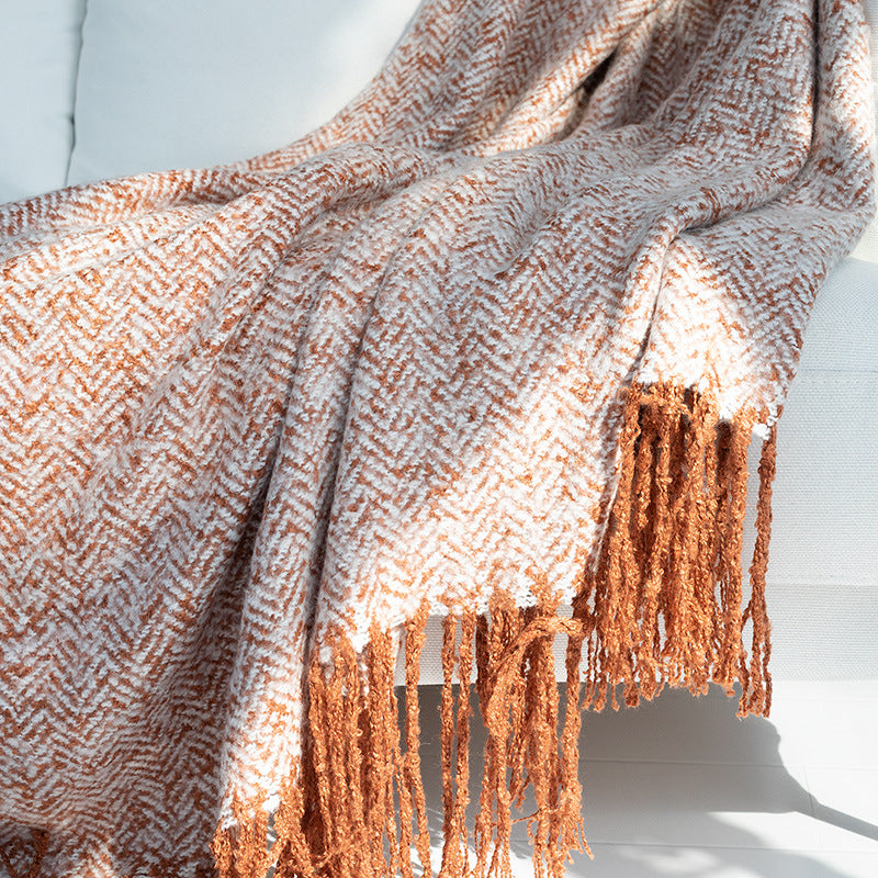 Coarsely woven throw blanket with herringbone jacquard and long fringes