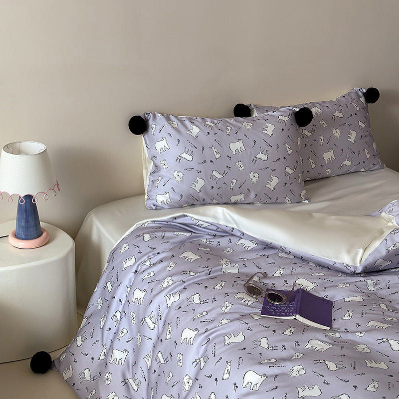 Children's bedding set with cute bunny print, pom-pom corners, and soft cotton satin