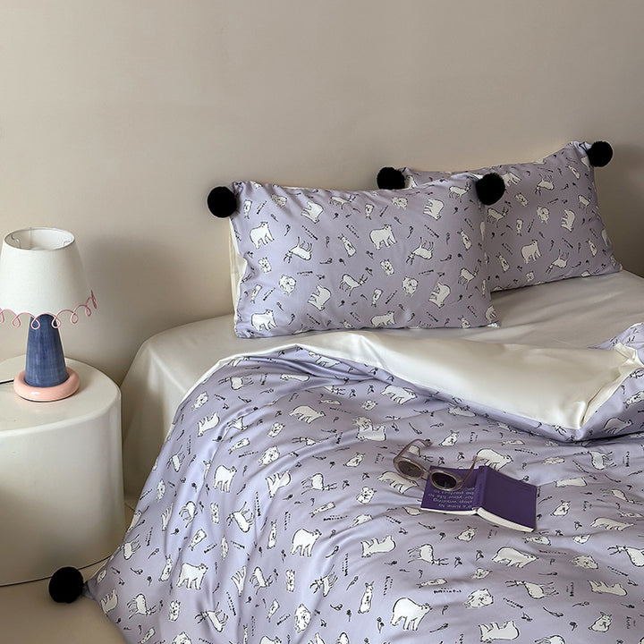 Children's bedding set with cute bunny print, pom-pom corners, and soft cotton satin