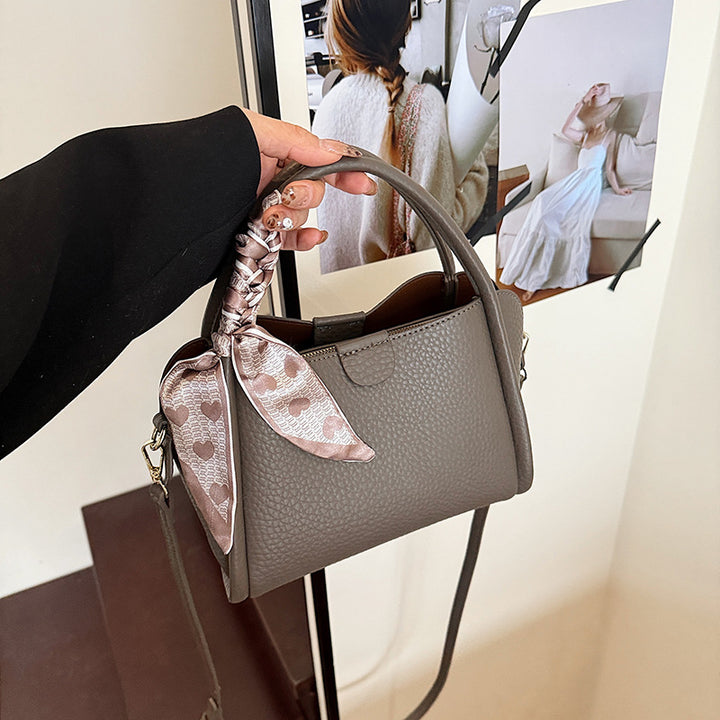 Elegant Textured Handheld Satchel