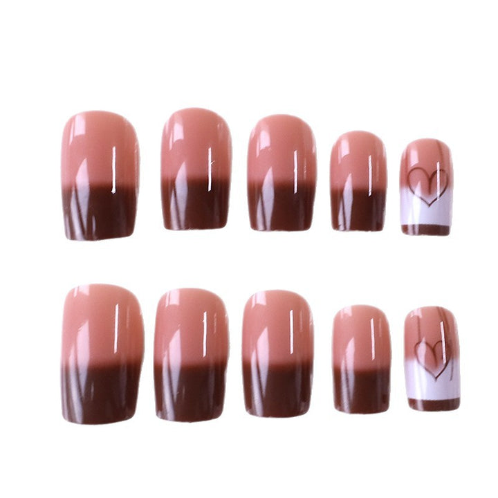 Artistic Heart-Embellished Nail Design Kalsten
