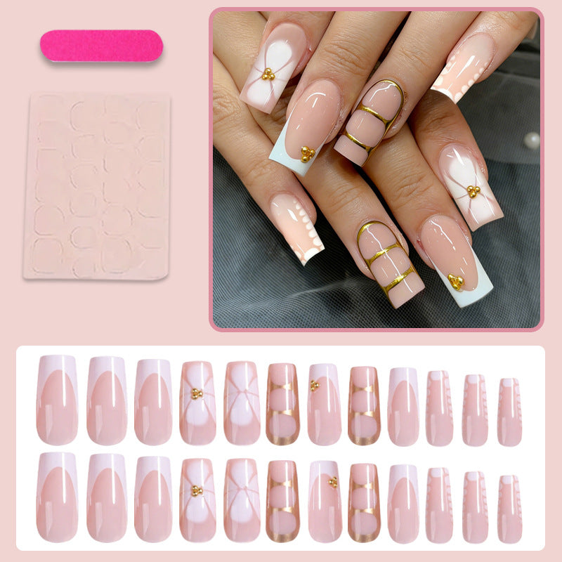 Artificial nail set with elegant gold embellishments and romantic accents Kalsten