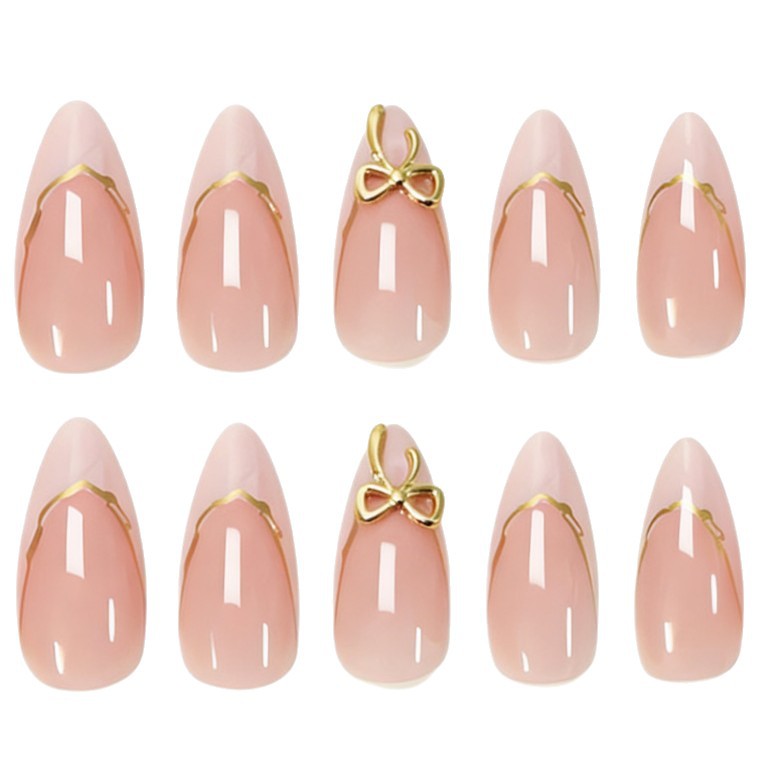Artificial nails with elegant tip decorations and golden accents Kalsten