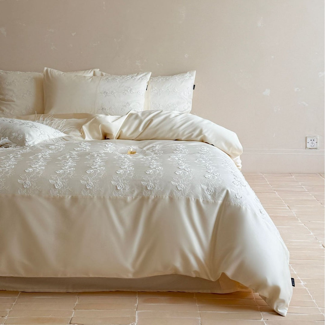 Luxurious satin bedding set with floral embroidery and pillowcases