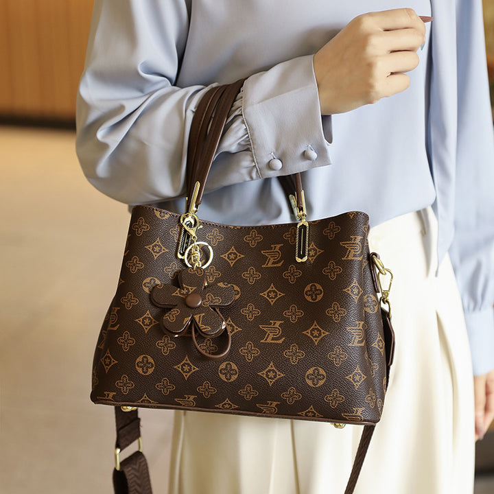 Elegant Handheld Tote Bag with Charming Floral Keychain