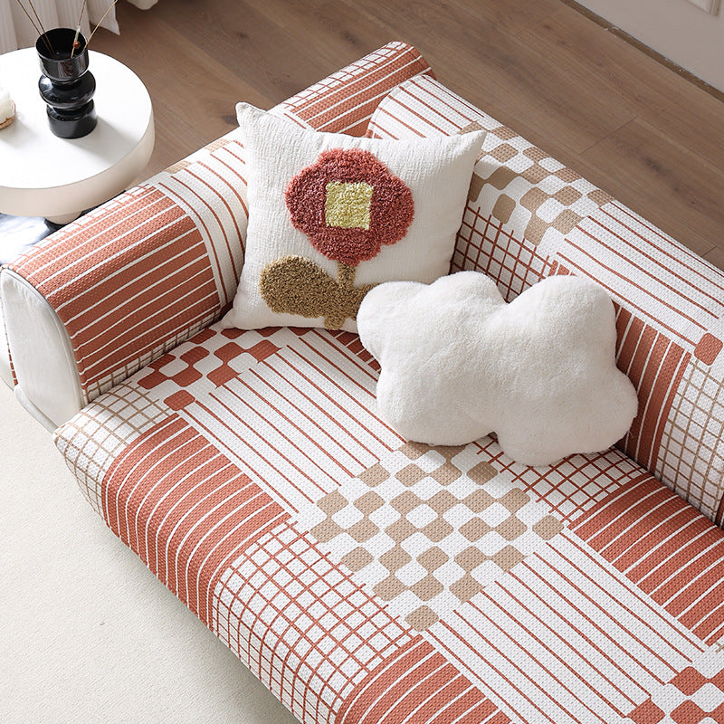 Stretch sofa cover with woven ethno jacquard and anti-slip