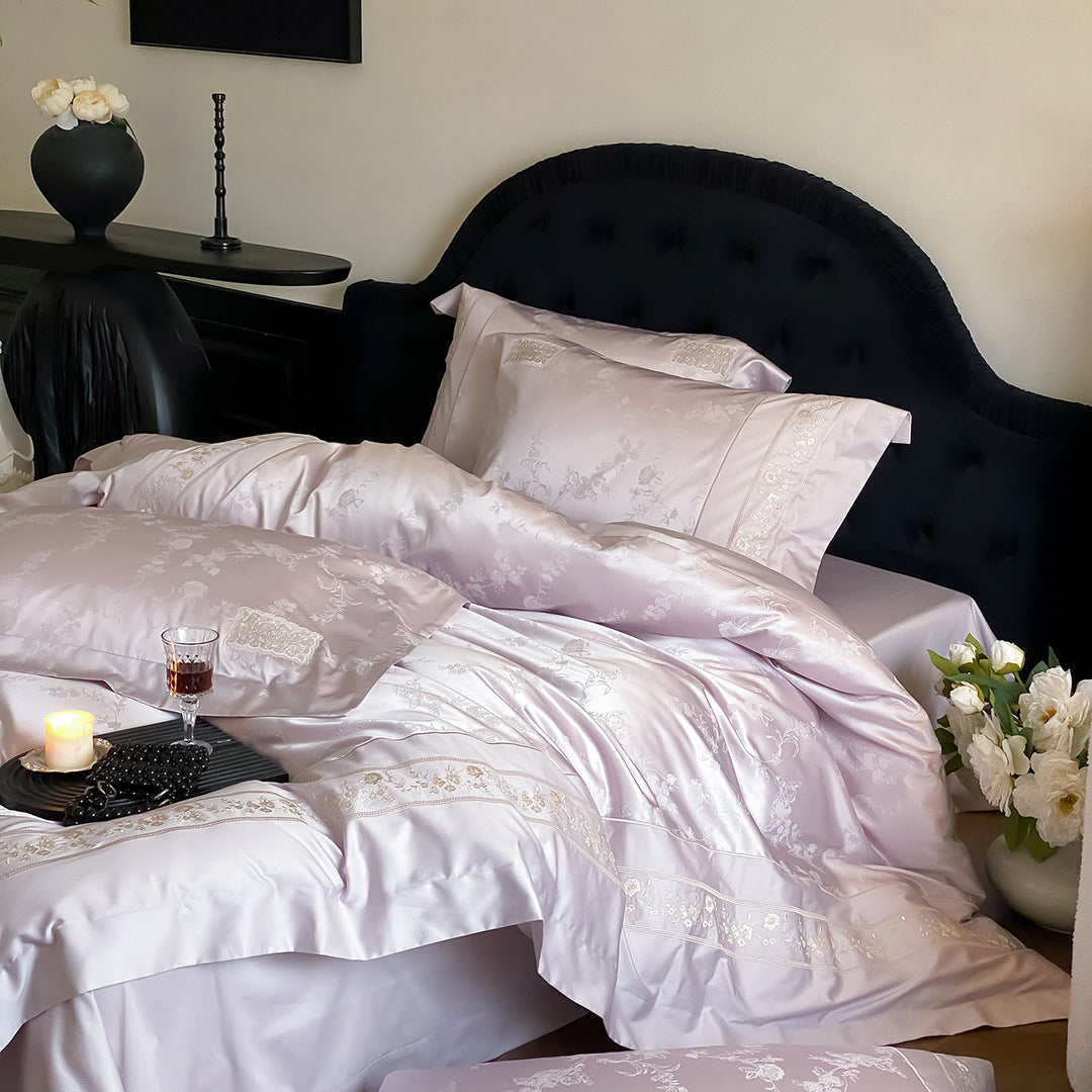 Fine satin bedding set with tonal floral jacquard and fine embroidered border