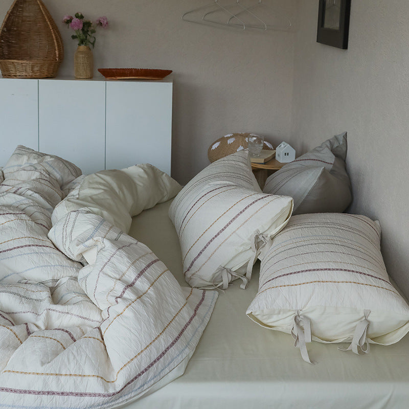 Linen-cotton bedding set with natural waffle texture and reversible function