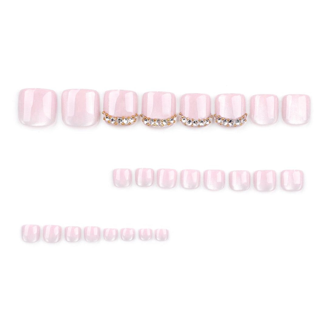 Artful toenail art with glitter and rhinestone decorations Kalsten