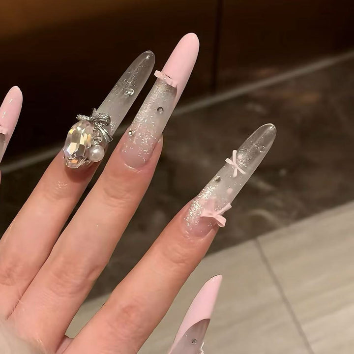 Glamorous Long Stiletto Nail Art Extensions with Rhinestone Accents