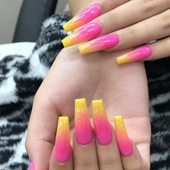 Artificial nail tips in modern ombre design Kalsten