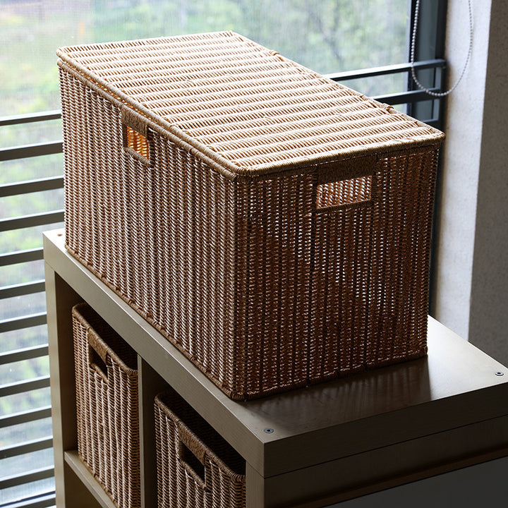 Unisex storage basket made of natural material with practical handles Kalsten