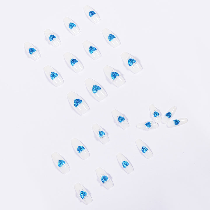 Artful nail art with heart-shaped accents Kalsten