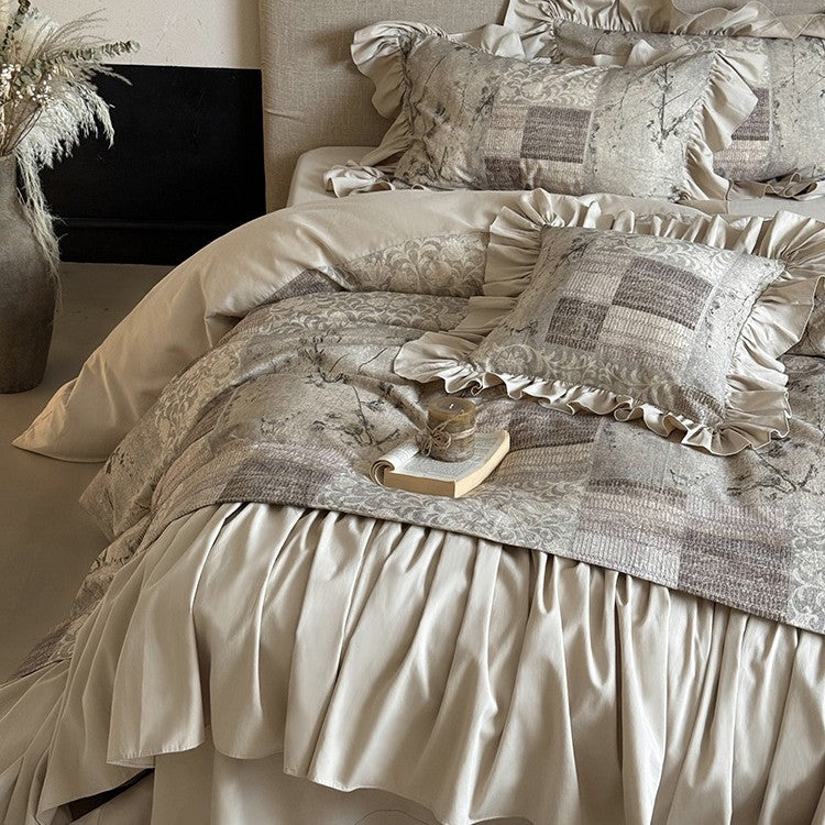 Bed linen set with gathered bed skirt and decorative frill border