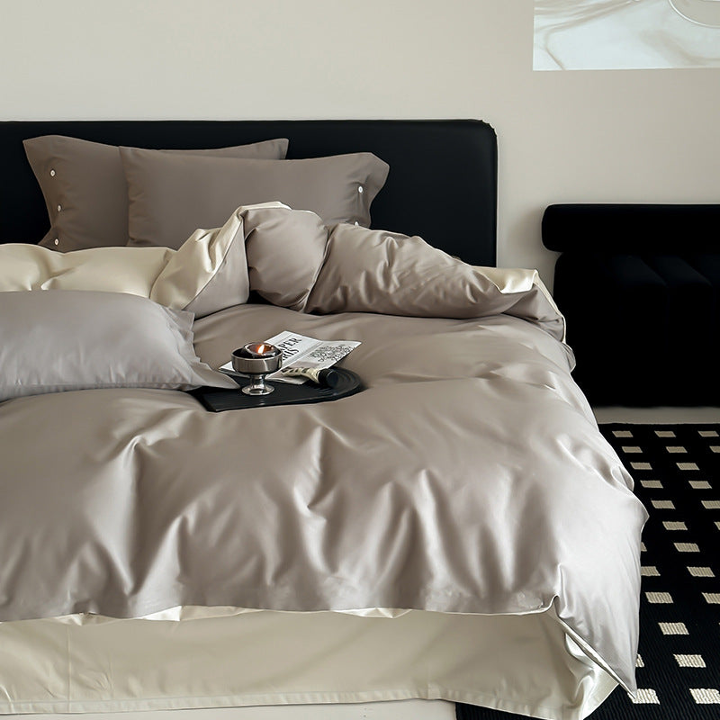 Reversible bedding set made of fine cotton satin with button placket and contrasting back