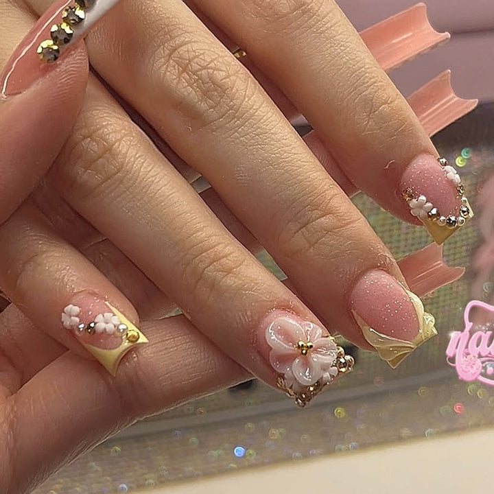 Nail art set with glamorous glitter and flower accents Kalsten