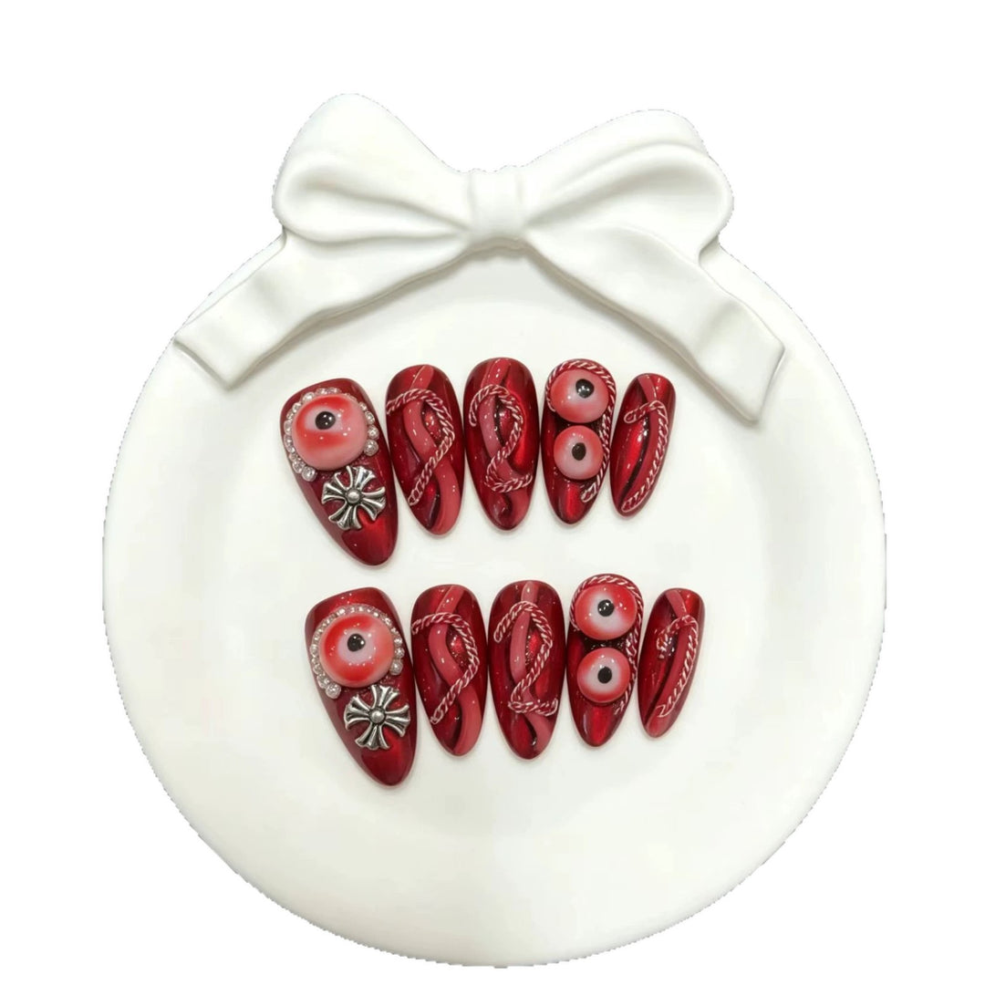 Artistic Press-On Nail Art Set with Unique Red Designs