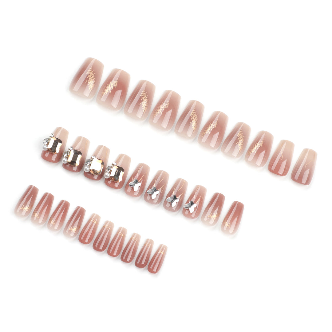 Artificial nail art with elegant jewelry accents Kalsten