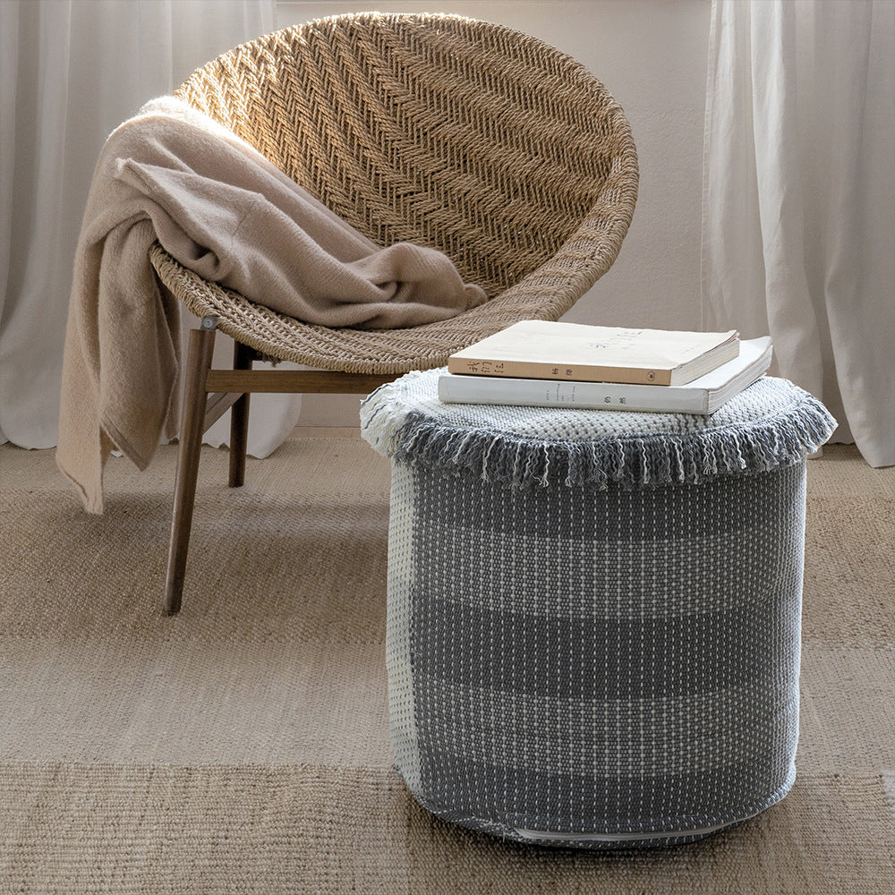 Padded pouf seat ottoman with woven structure and carrying handle