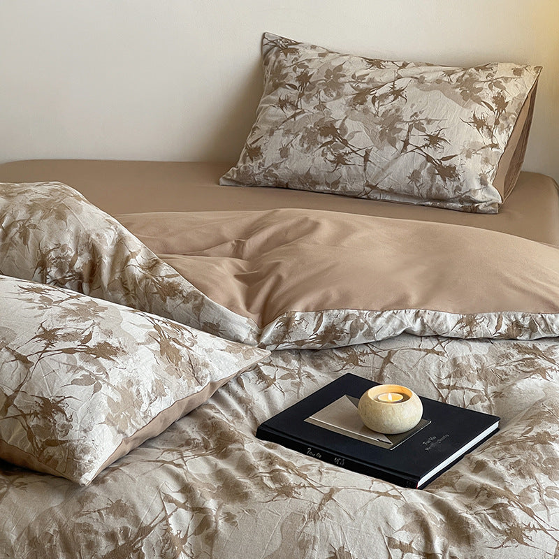 Luxurious cotton bedding set with abstract floral print and reversible function