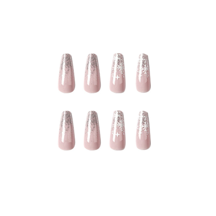 Artful nail art in winter design with glitter and snowflakes Kalsten
