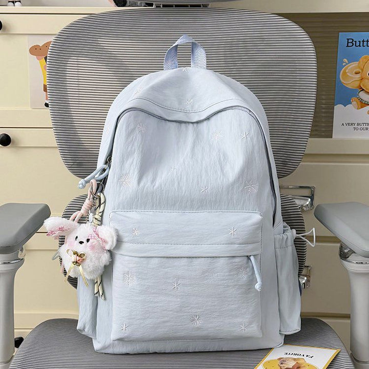 Playful backpack with fine embroidery Kalsten