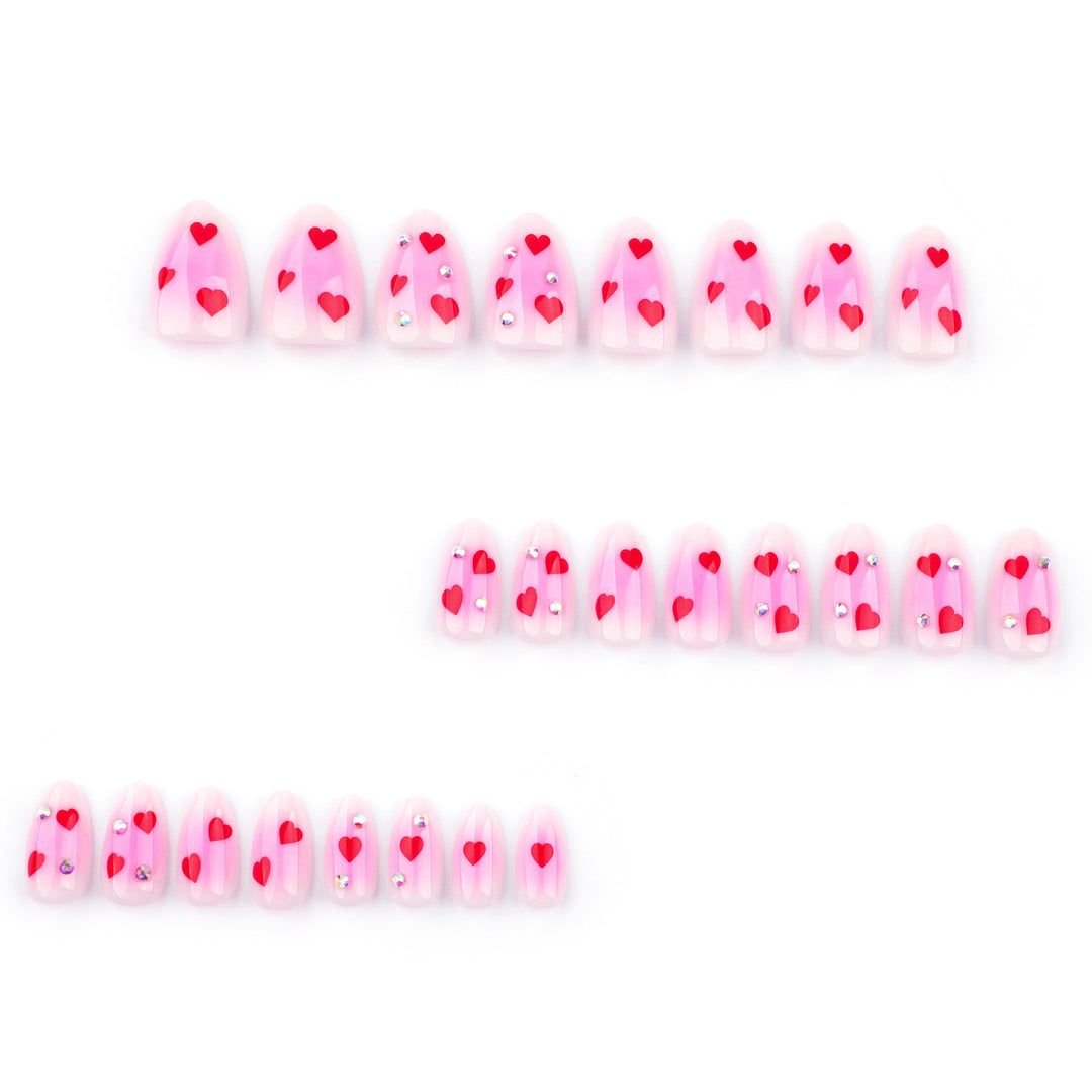 Artful nail art with heart motifs and glamorous details Kalsten