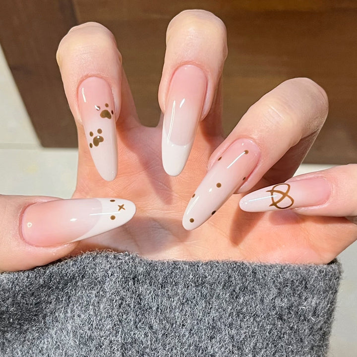 Glamorous Stiletto Press-On Nail Design with Elegant Gold Accents Kalsten