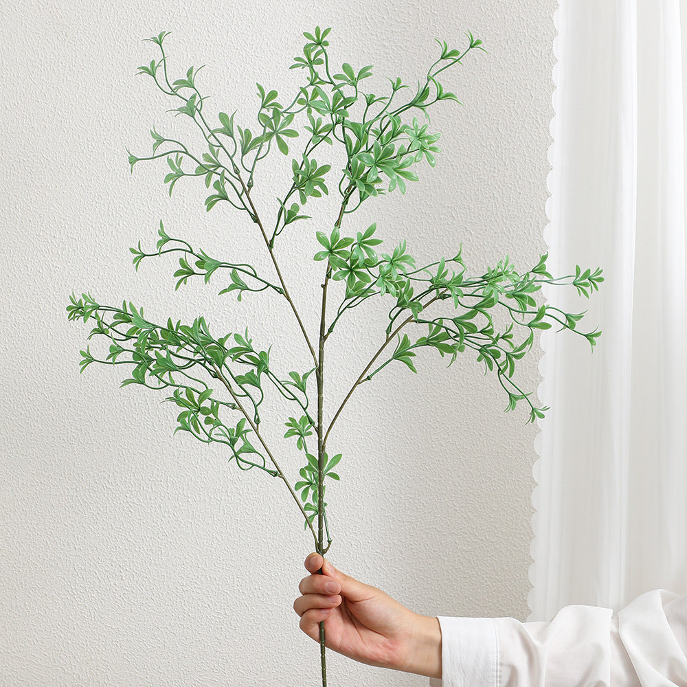 Decorative artificial branch with filigree, curved twigs