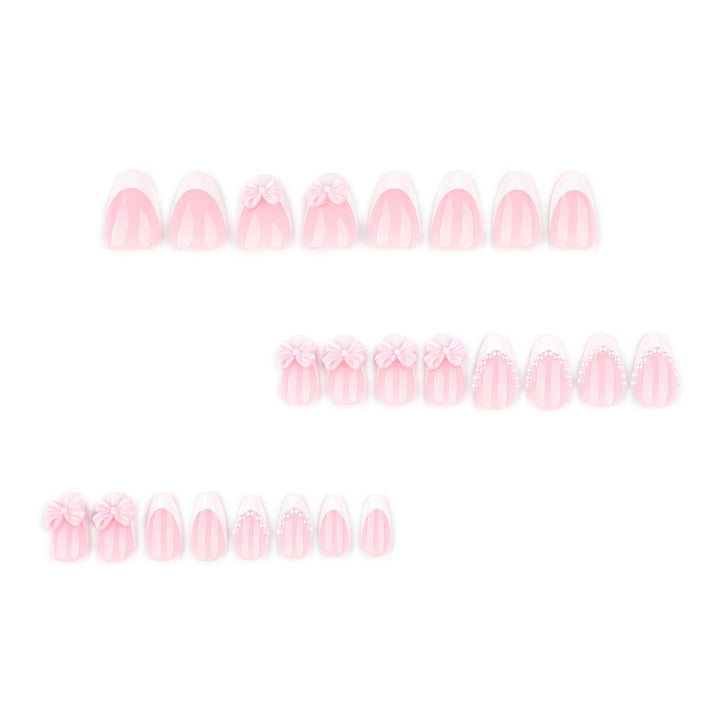 Artful Stiletto Nails with Delicate Bow Accents Kalsten