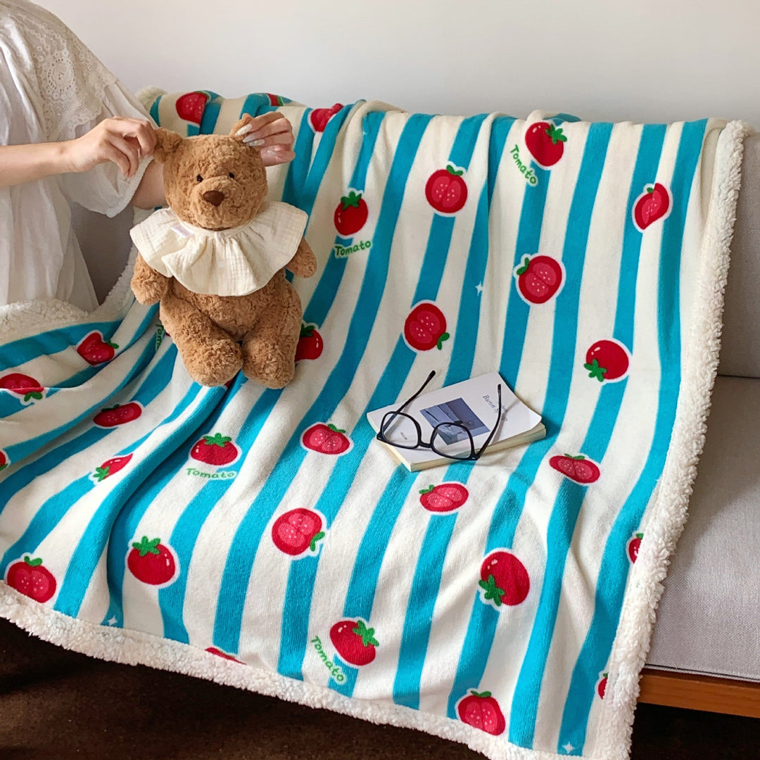 Reversible fleece blanket with cartoon cat design and teddy lining
