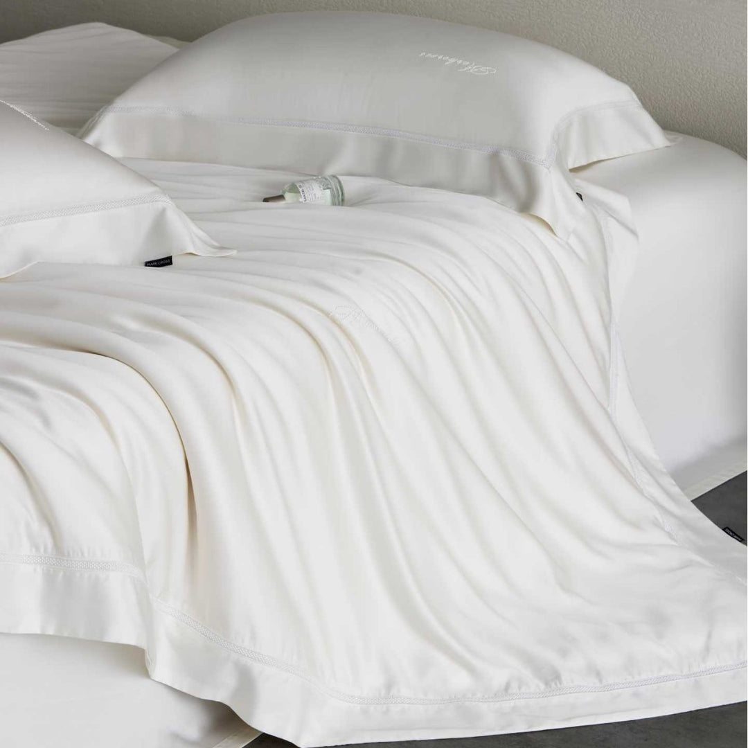 Silky-smooth cotton satin bedding set with fine decorative ribbon and pillowcases