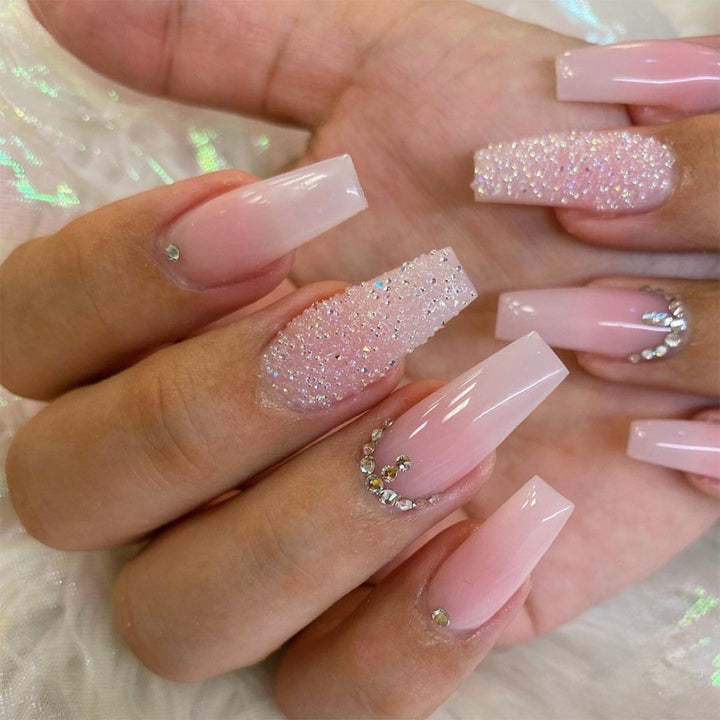 Artificial nail set with sparkling glitter effects and delicate winter motif Kalsten