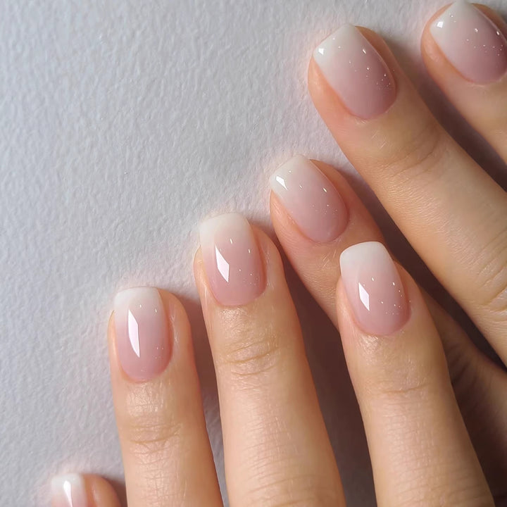 Artificial nails in modern ombre look Kalsten