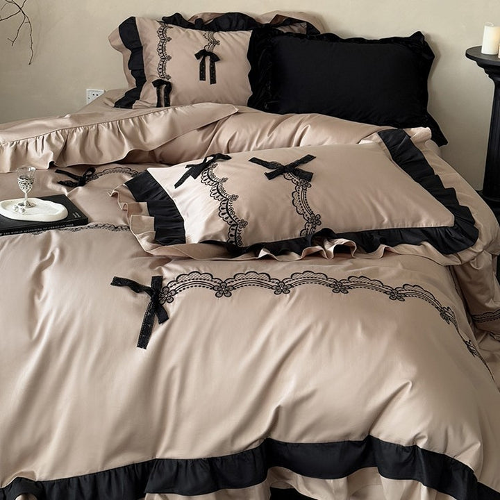 Luxurious satin bedding set with ruffles, lace embroidery and decorative bows