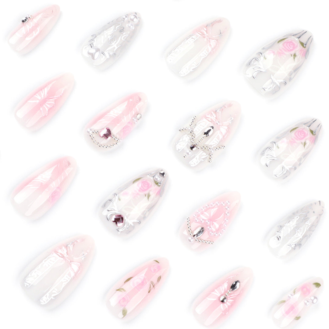 Artistic nail extensions with elegant flower decoration Kalsten