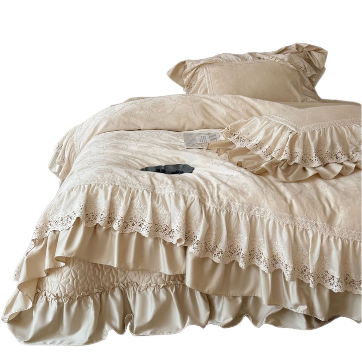 Vintage-inspired bedding set with layered ruffles and lace inset