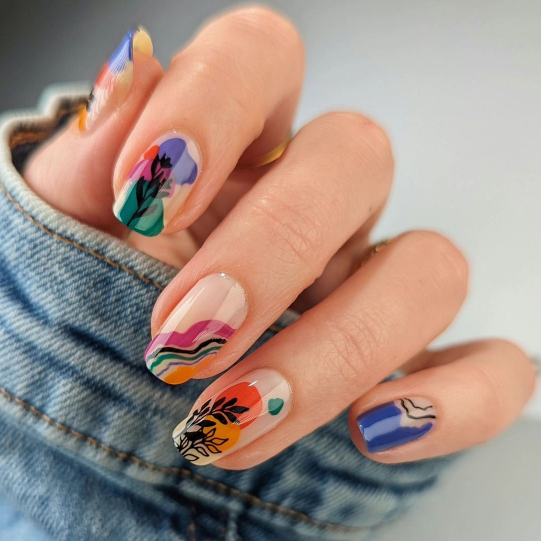 Artistic nail design with colorful accents Kalsten