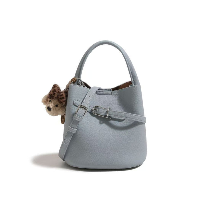 Chic Pebbled Leather Handbag with Cute Charm