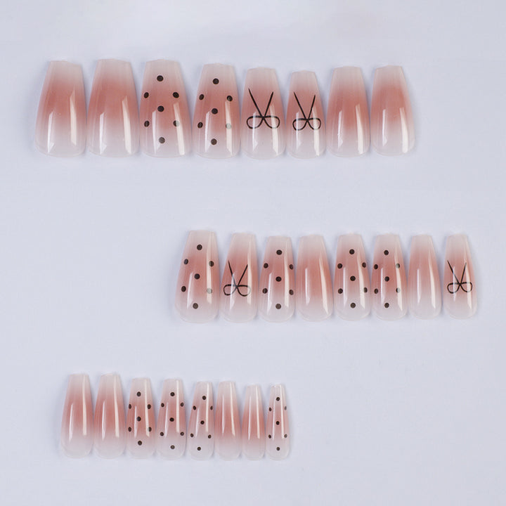 Artificial nails with modern dot design and elegant accents Kalsten