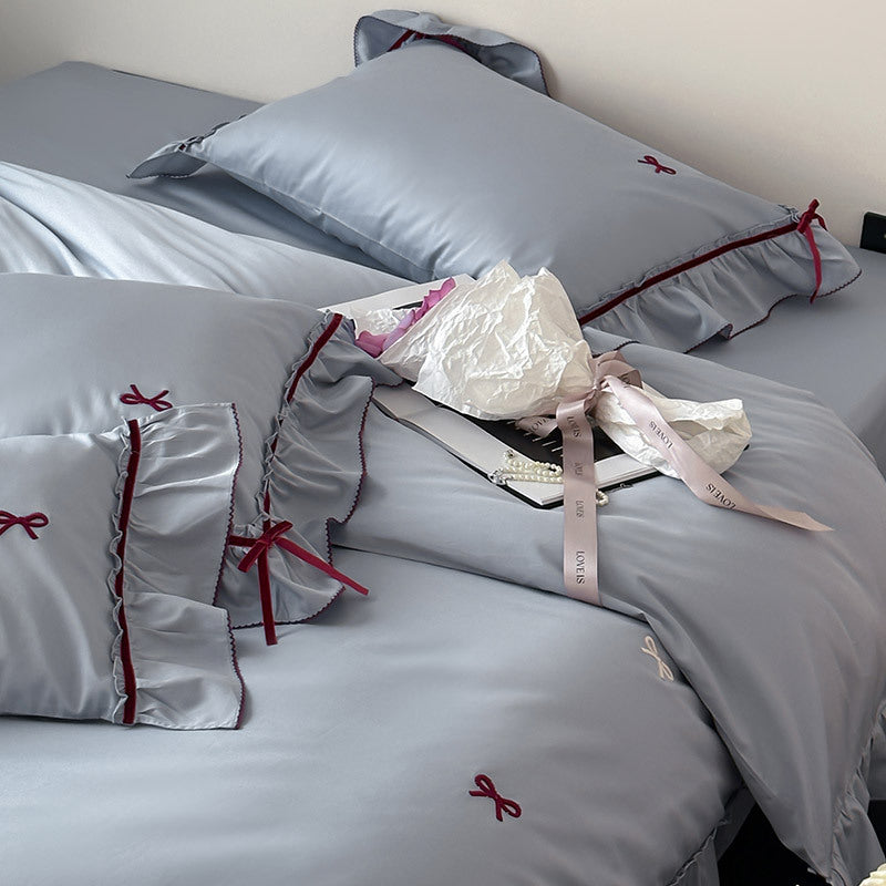 Premium bedding set made of cotton satin with ruffles and bow embroidery
