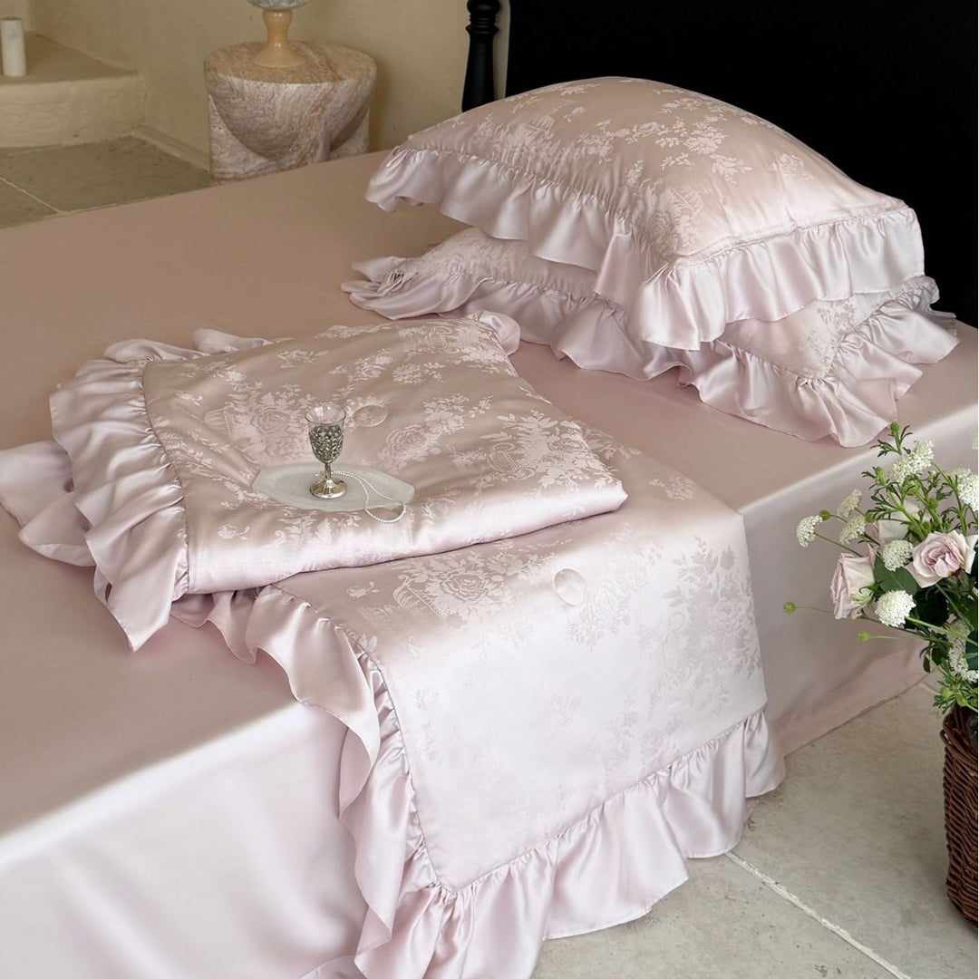 Luxury satin bed set with jacquard relief and ruffled edges