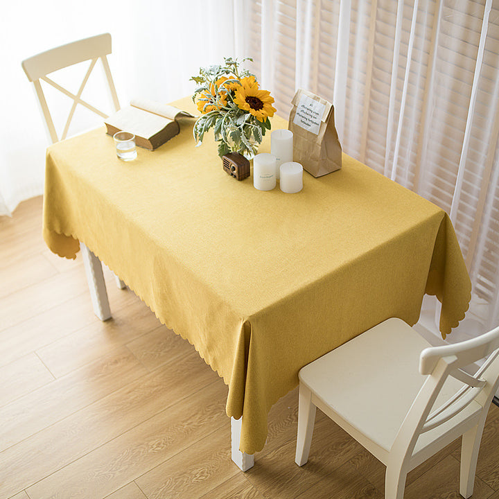 Rectangular tablecloth in linen look with wavy arc edge