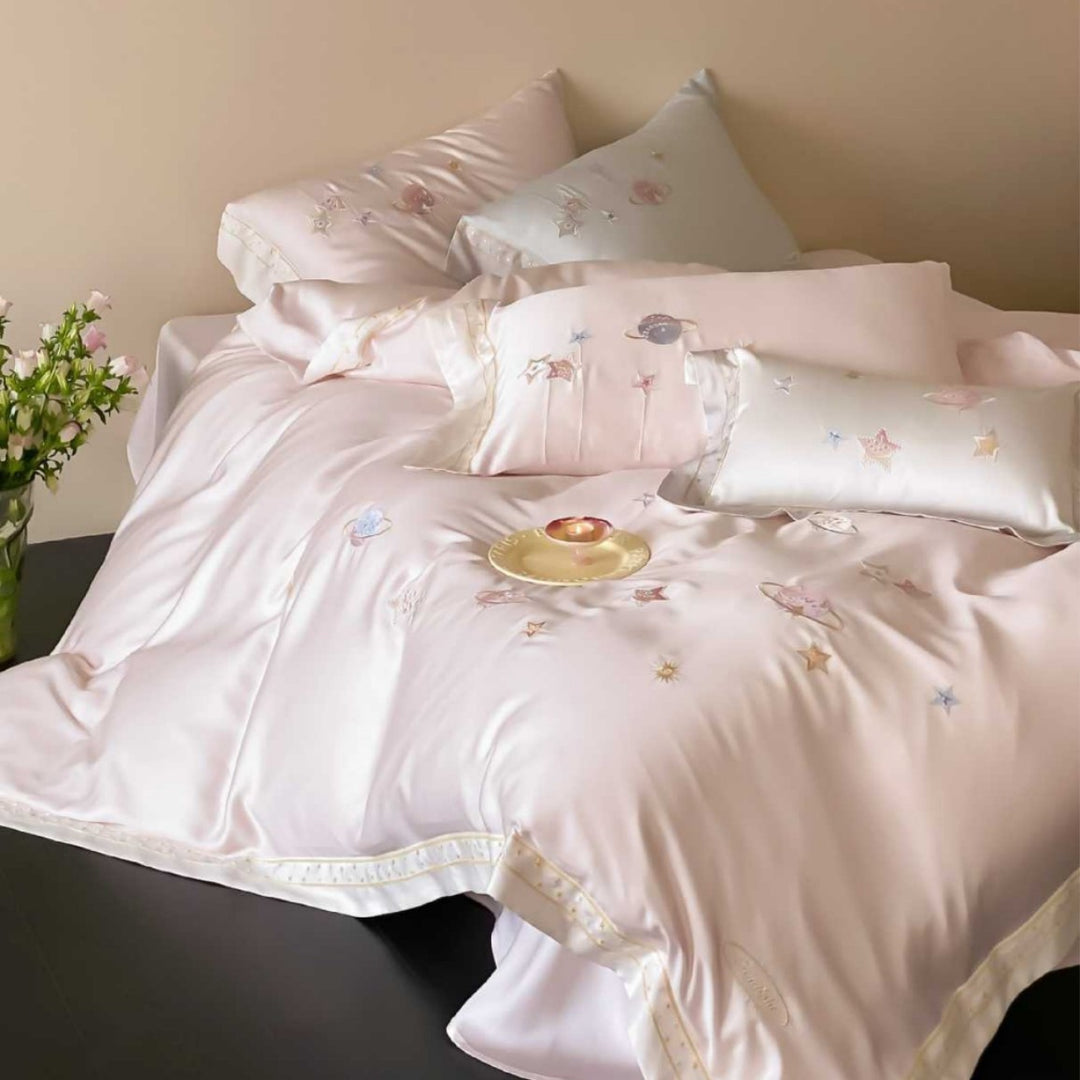 Satin bedding set with embroidered galaxy motif and silky smooth finish