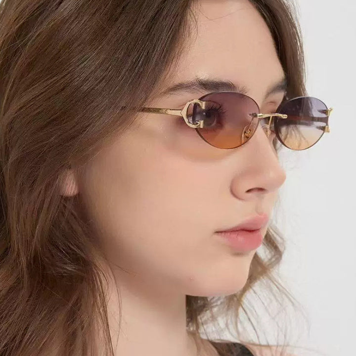 Women's elegant oval-shaped sunglasses with fashionable metal frame Kalsten
